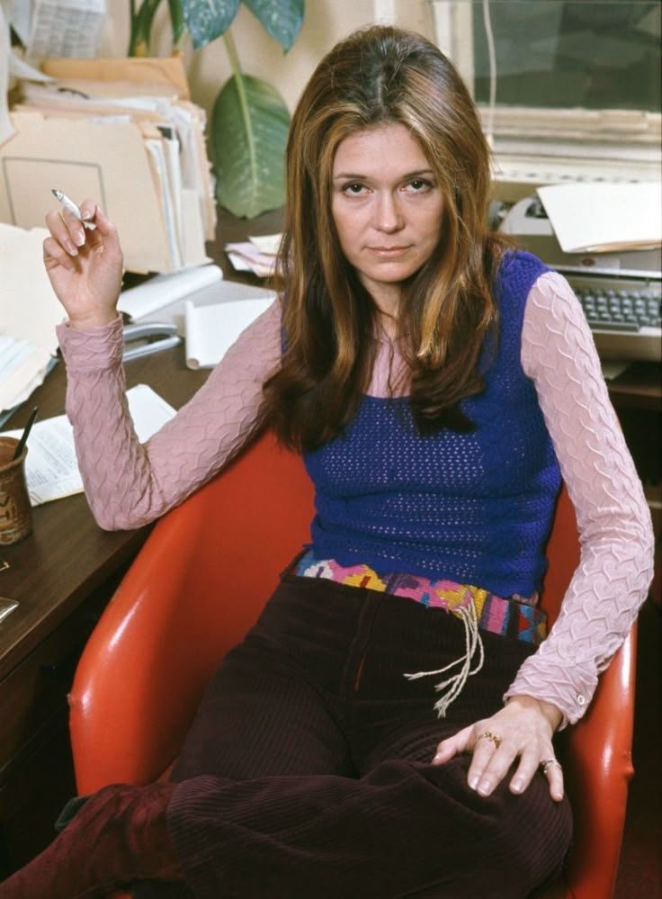Gloria Steinem at her desk